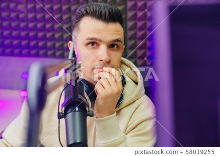 pensive professional radio host broadcasts live reads news pensive professional radio host broadcasts live reads news 88019255