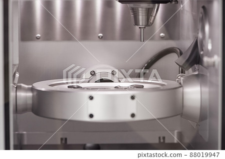 Cad cam milling machine in dental laboratory. Production of high esthetic dental crowns and dentures. Cad cam milling machine in dental laboratory. Production of high esthetic dental crowns and dentures. 88019947