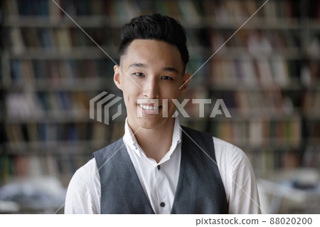 Head shot portrait of smiling Korean handsome man. 88020200