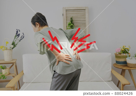 Elderly back pain living room 88024426