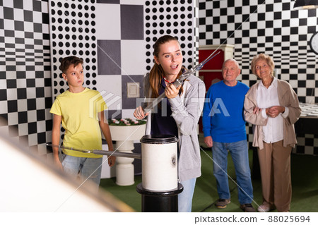Portrait of family who is visiting lost room stylized under chessroom 88025694