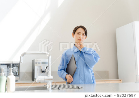 Kitchen worker in trouble Kitchen worker in trouble 88027697