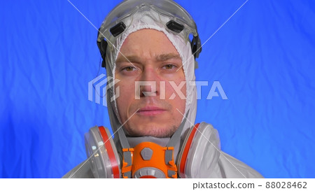Scientist virologist in respirator. Man close up look, wearing protective medical mask. Concept health safety N1H1 coronavirus epidemic 2019 nCoV. 88028462