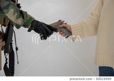 Handing over the gun 88028999