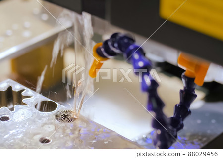 Wire cutting machine working with sheet metal with sparks at factory Wire cutting machine working with sheet metal with sparks at factory 88029456