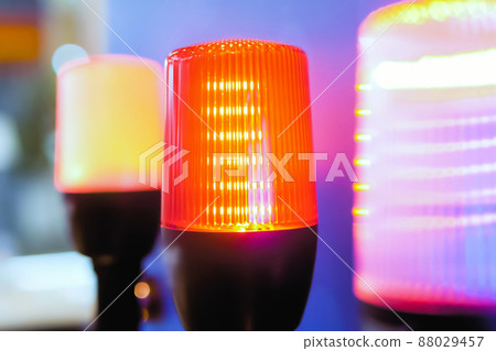 Close up of alarm lamp signal warning flashing lights for industrial machinery Close up of alarm lamp signal warning flashing lights for industrial machinery 88029457
