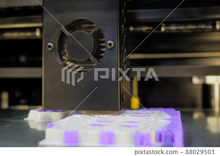 3D printing machine making plastic model - close up 3D printing machine making plastic model - close up 88029503