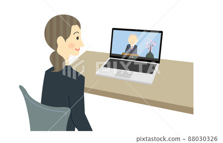 A woman attending an online induction ceremony A woman attending an online induction ceremony 88030326