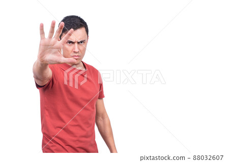 Male model demonstrating stop gesture on white background Male model demonstrating stop gesture on white background 88032607