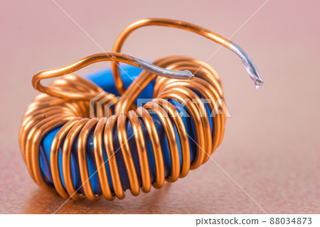 Single electric transformer copper coil close-up Single electric transformer copper coil close-up 88034873