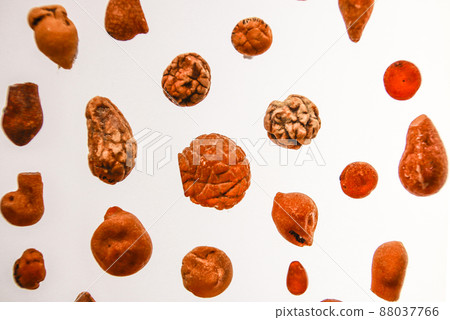 Fragments of amber close-up. Natural unpolished amber. Fragments of amber close-up. Natural unpolished amber. 88037766