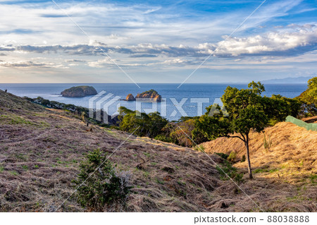 pacific ocean waves on rock in Playa Poor Calzon Beach, El Coco Costa Rica pacific ocean waves on rock in Playa Poor Calzon Beach, El Coco Costa Rica 88038888