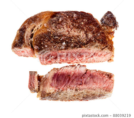 sliced medium rare cooked ribeye beef steak 88039219