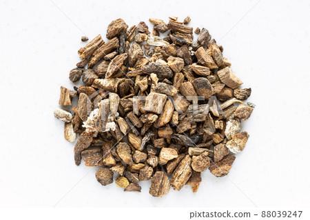 top view of pile of chopped dried burdock roots top view of pile of chopped dried burdock roots 88039247