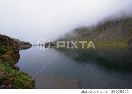 View of Balea Lake. Glacial lake, on Transfagarasan highway View of Balea Lake. Glacial lake, on Transfagarasan highway 88039435