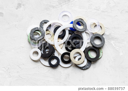 pile of various gaskets for plumbing water systems pile of various gaskets for plumbing water systems 88039737