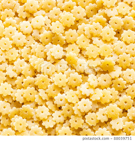background from uncooked stelle pasta pieces background from uncooked stelle pasta pieces 88039751