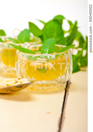 Arab traditional mint and pine nuts tea Arab traditional mint and pine nuts tea 88040002