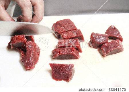 Cooking scene of deer block meat (jibier) hunting survival image Cooking scene of deer block meat (jibier) hunting survival image 88041370