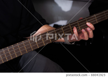 A man with a base at hand A man with a base at hand 88041923