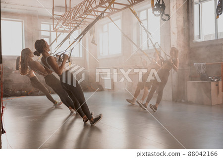 Shot of fitness group having workout session at gym Shot of fitness group having workout session at gym 88042166