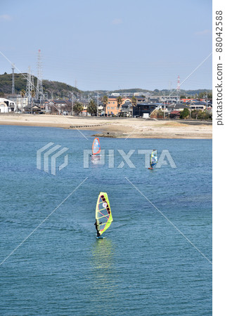 Surfers enjoying the spring breeze 88042588