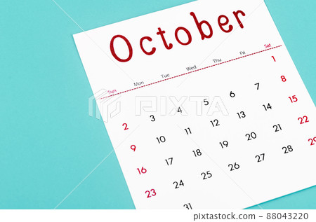 October 2022 calendar sheet on light blue background. 88043220
