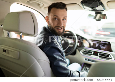 a young woman bought and insured her new car at a car dealership 88043665