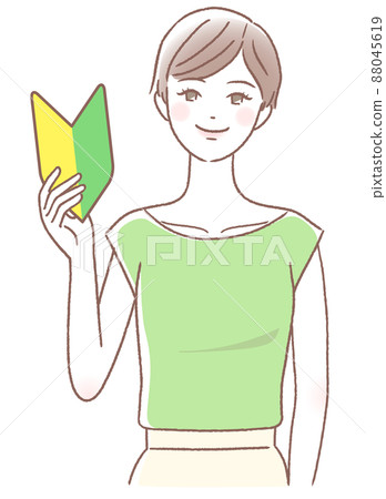 一個帶著初學者標誌微笑的年輕女子 88045619