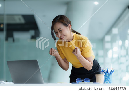 Successful business woman excited when her business growth. Finance concept. 88045789