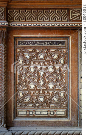 Sigle arabesque sash of an old mamluk era cupboard with geometrical decorations, Cairo, Egypt 88046018