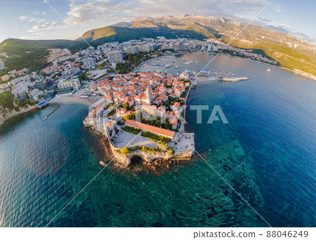 Old town in Budva in a beautiful summer day, Montenegro. Aerial image. Top view Old town in Budva in a beautiful summer day, Montenegro. Aerial image. Top view 88046249