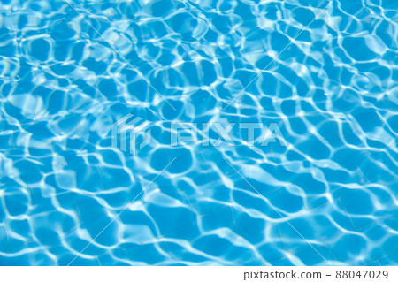 Blurred transparent ripple of blue clear water texture in a swimming pool in sunlight. 88047029
