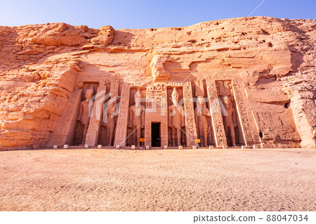 Standing statue in front of The Temple of Hathor and Nefertari. Standing statue in front of The Temple of Hathor and Nefertari. 88047034