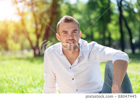 Young man in the park Young man in the park 88047445