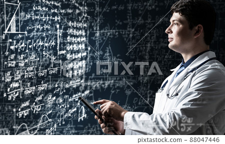 scientist with tablet scientist with tablet 88047446