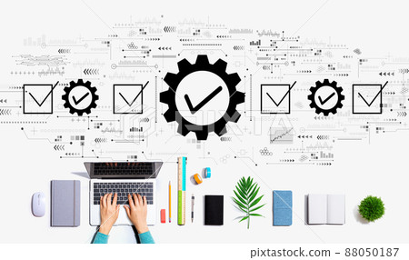 Quality control approval with person using a laptop Quality control approval with person using a laptop 88050187