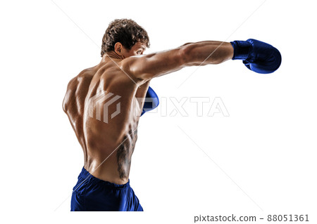 Side view of boxer in blue gloves who practicing swing on white background. Sport concept  88051361