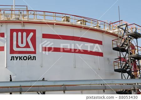 A large storage tank for light oil products with the logo of LUKOIL 88053430