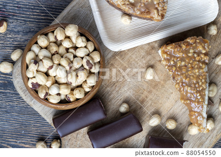 sweet and delicious cake with nuts and caramel sweet and delicious cake with nuts and caramel 88054550