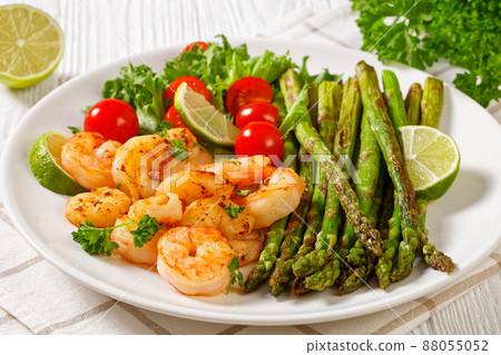 toasty asparagus with fried prawns, lime and salad toasty asparagus with fried prawns, lime and salad 88055052