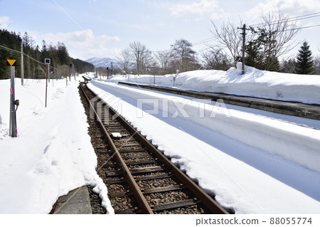 Photographing the scenery of Neppu Station in Kuromatsunai, Hokkaido in early spring 88055774