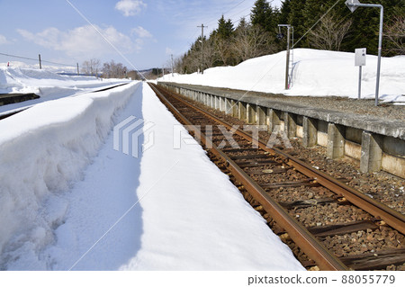 Photographing the scenery of Neppu Station in Kuromatsunai, Hokkaido in early spring 88055779