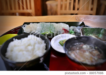 Squid sashimi set meal (Kazamaura Village, Aomori Prefecture) 88057086