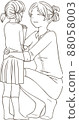 A girl giving a carnation to her mother on Mother's Day 88058003