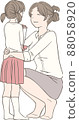 A girl giving a carnation to her mother on Mother's Day 88058920