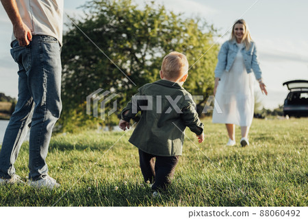 Happy Young Couple, Mom and Dad with Toddler Son Having Family Time Outdoors, Weekend Road Trip by Car 88060492