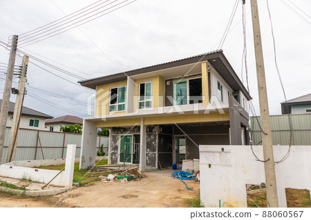construction residential new house in progress at building site 88060567