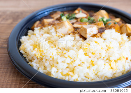 Chinese lunch with delicious fried rice and mapo tofu Chinese lunch with delicious fried rice and mapo tofu 88061025