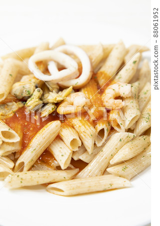 Seafood penne with delicious pescatore sauce 88061952